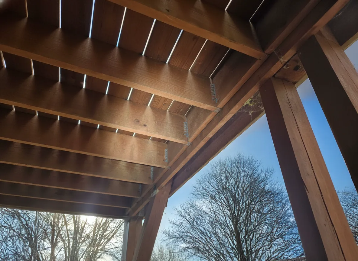 Under-deck framing showing joists and structural connections