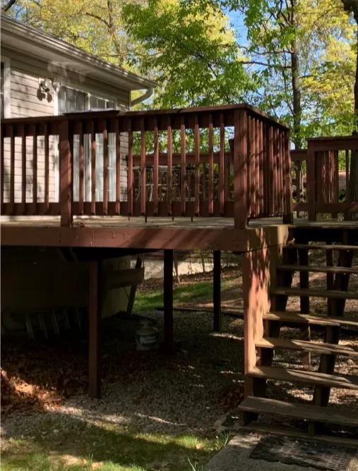 Before: worn wood railing with loose connections