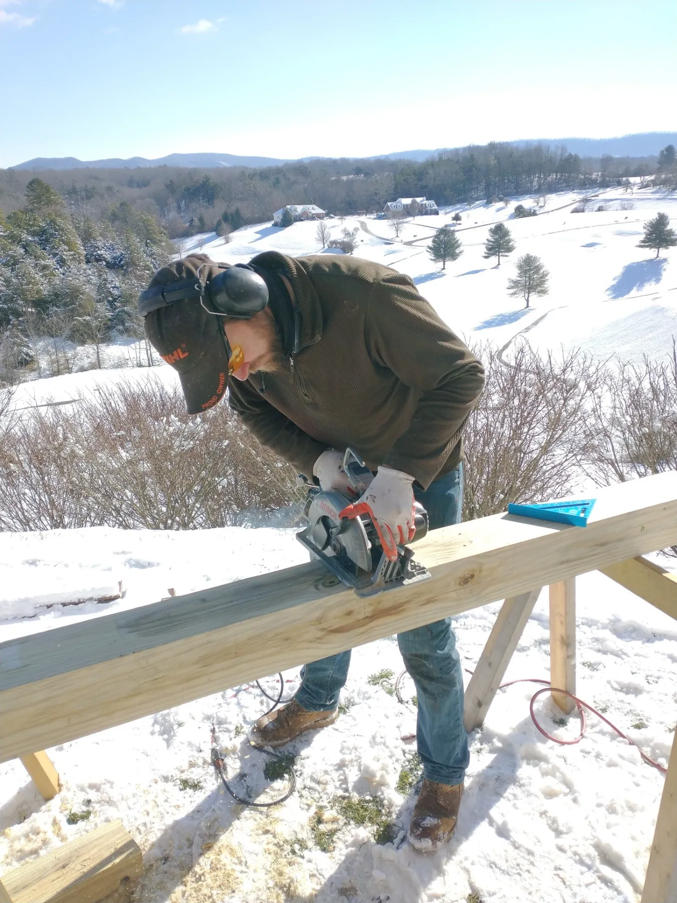 ReDeck Virginia crew working on a deck in the snow